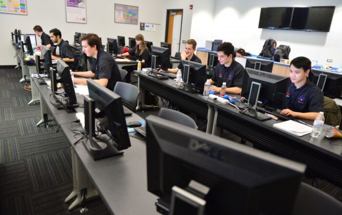 Image of students competing in a cyber competition
